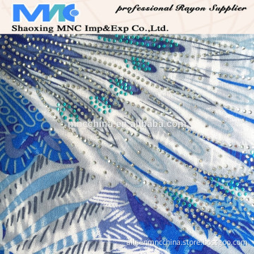 rayon print with stone fabric